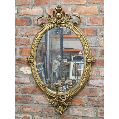 2414 - Good quality antique Florentine giltwood girandole wall mirror, oval form with three scrolled sconce... 