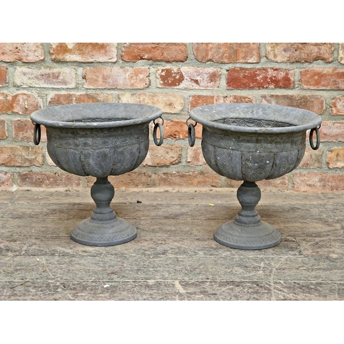 1039 - Pair of tin lead effect urns with lobed bowls and ring handles H 35cm (2)