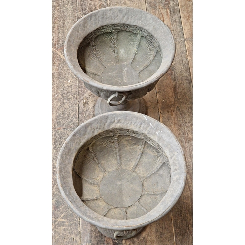 1039 - Pair of tin lead effect urns with lobed bowls and ring handles H 35cm (2)