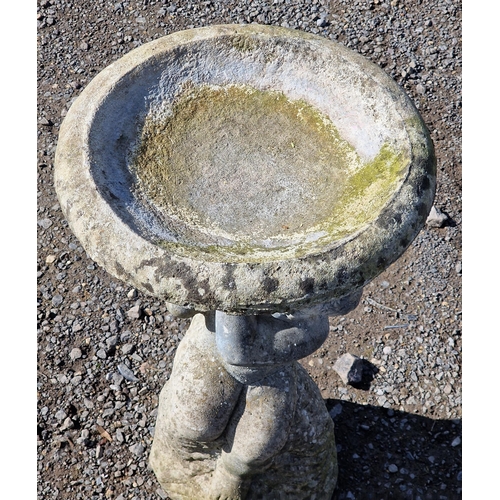 1048 - Reconstituted stone cherub bird bath, H 65cm x W 40cm