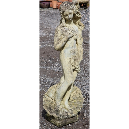 1049 - Reconstituted stone garden statue of a nude female stood in a shell, H 84cm