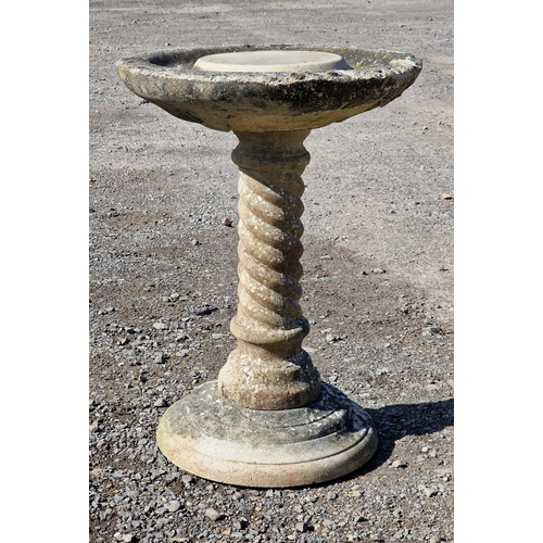 1061 - A weathered reconstituted stone garden bird bath / sundial base with barley twist column, H 55cm x W... 