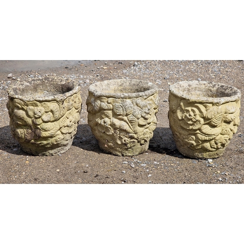 1071 - Three reconstituted stone circular garden planters with floral decoration, H 25cm x W 28cm