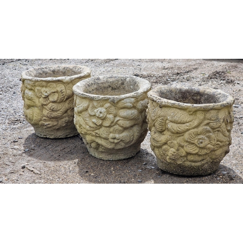 1071 - Three reconstituted stone circular garden planters with floral decoration, H 25cm x W 28cm