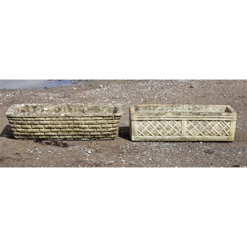 1073 - Two weathered reconstituted stone garden troughs, one with simulated brick work, the other of lattic... 