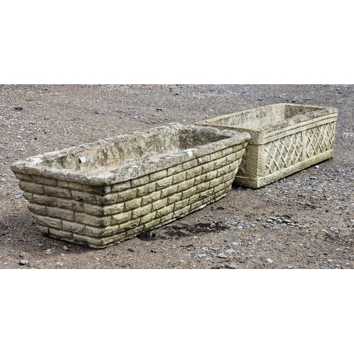 1073 - Two weathered reconstituted stone garden troughs, one with simulated brick work, the other of lattic... 