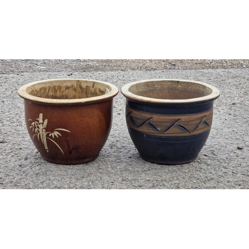 1076 - Two glazed terracotta pots , H 20cm x W 30cm (2)