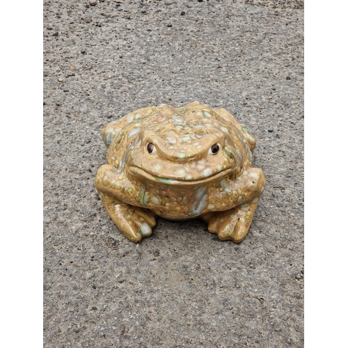 1084 - A ceramic garden ornament in the form of a toad, signed Jean Fowler, H 8cm x W 25cm