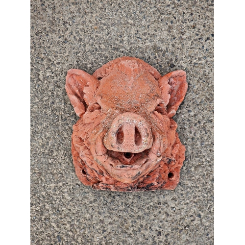 1092 - Reconstituted stone wall hanging ornament in the form of a boars head, with terracotta finish, H 32c... 