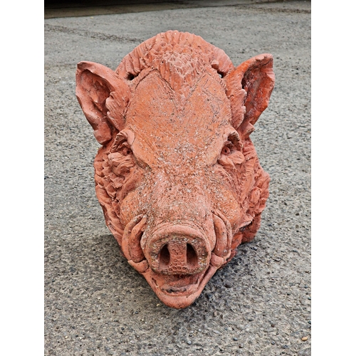 1092 - Reconstituted stone wall hanging ornament in the form of a boars head, with terracotta finish, H 32c... 