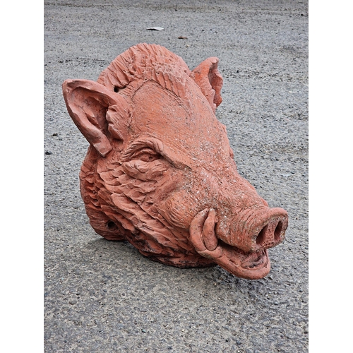 1092 - Reconstituted stone wall hanging ornament in the form of a boars head, with terracotta finish, H 32c... 