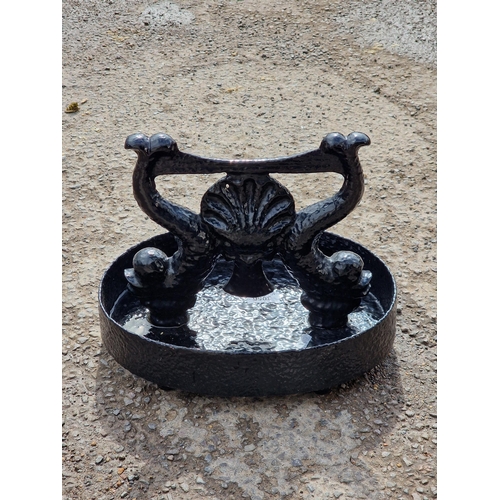 1096 - Painted cast iron boot scraper with stylised fish and shell design , H 25cm x W 32cm x D 20cm