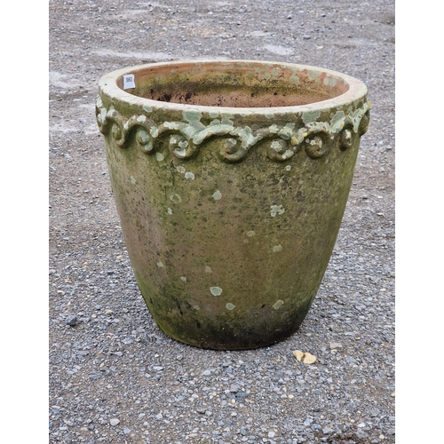 1100 - Weathered Terracotta planter with scrolling relief detail, H 38cm