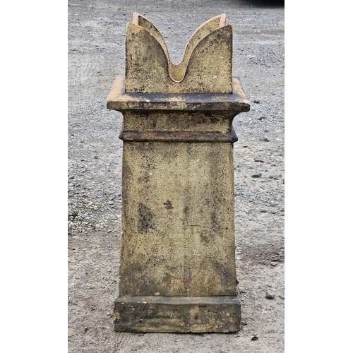 1127 - Weathered buff coloured castellated chimney pot, H 75cm x W 31cm