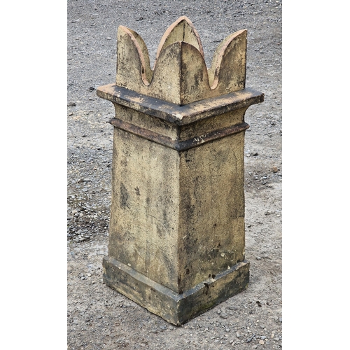 1127 - Weathered buff coloured castellated chimney pot, H 75cm x W 31cm