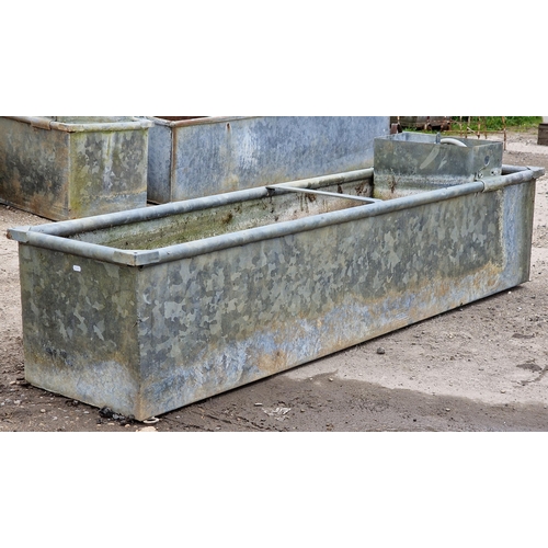 1132 - Good vintage rectangular galvanised steel trough with rounded edges together with a spare water pump... 