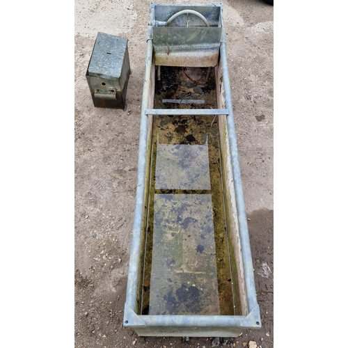 1132 - Good vintage rectangular galvanised steel trough with rounded edges together with a spare water pump... 