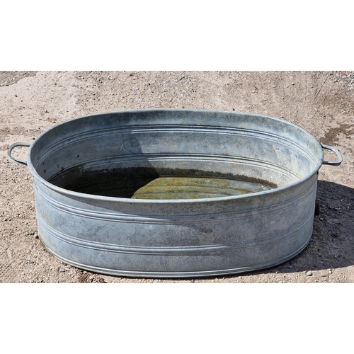 1144 - Vintage galvanised steel wash tub with twin carry handles, H 30cm x W 91cm, together with a shallow ... 