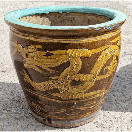 1157 - Four glazed terracotta planters with Chinese dragon decoration, H 35cm x W 39cm (4)