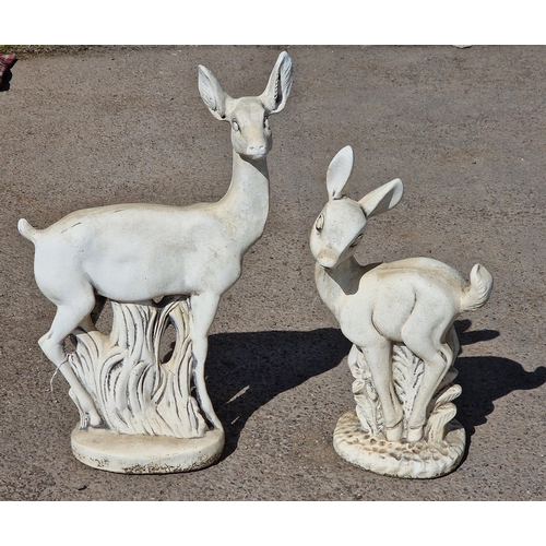 1162 - Two reconstituted stone garden statues of a deer and fawn, largest H 80cm (2)