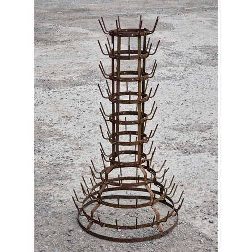 1180 - Antique French iron bottle dryer of tapered cylindrical form, H 100cm