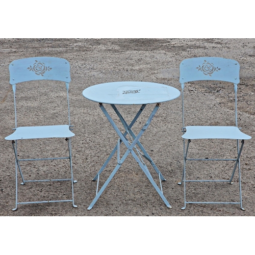 1190 - Painted folding metal three piece bistro set with pierced floral detail, H 68cm x W 59cm (table), H ... 