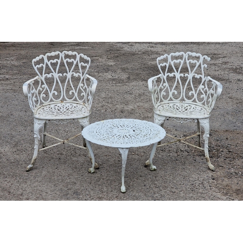 1197 - Pair of painted metal garden chairs with scrolling pierced detail, H 82cm, together with a painted m... 