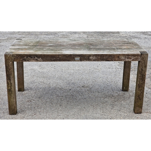 1198 - Teak garden table with slatted top, raised on square cut supports, stamped 'Panama Collection', H 75... 