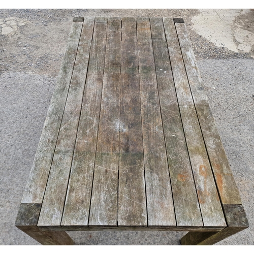 1198 - Teak garden table with slatted top, raised on square cut supports, stamped 'Panama Collection', H 75... 