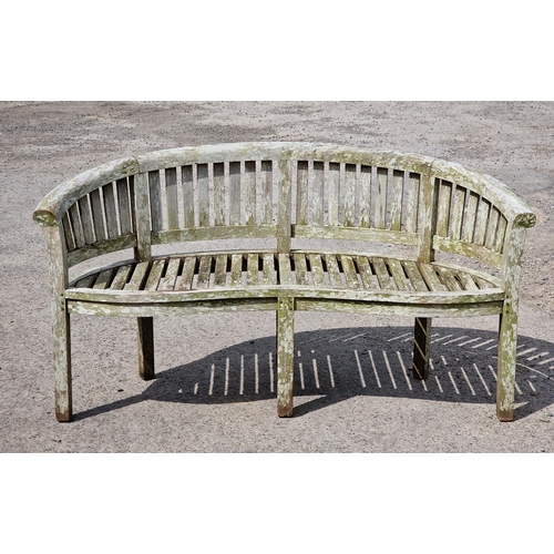 1209 - Weathered teak curved banana bench with slatted seat and back, H 85cm x W 157cm