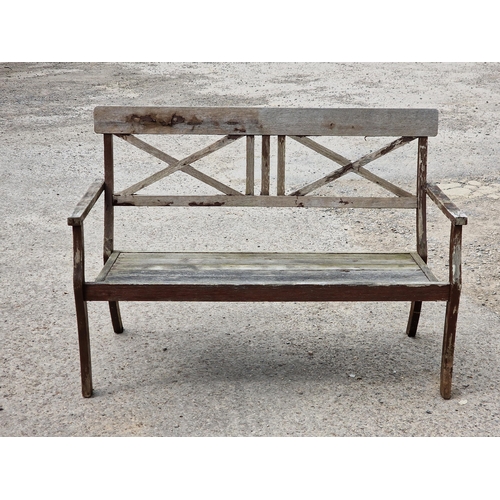 1212 - Stained teak garden bench with X frame back, stamped Charlston Collection, H 88cm x W 125cm