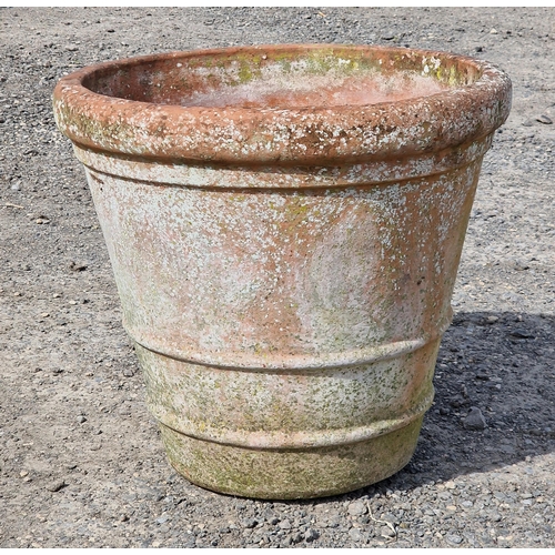 1220 - A large weathered terracotta planter with banded detail, H 52cm x W 55cm