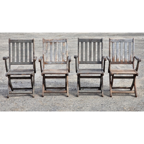 1222 - Set of four folding teak garden armchairs with slatted seats and backs, stamped Bridgman, H 93cm (4)... 