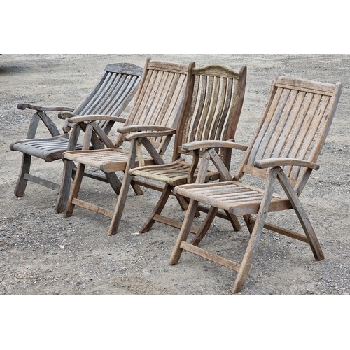 1225 - Four folding teak garden armchairs with slatted seats and backs of varying design (4) (AF)