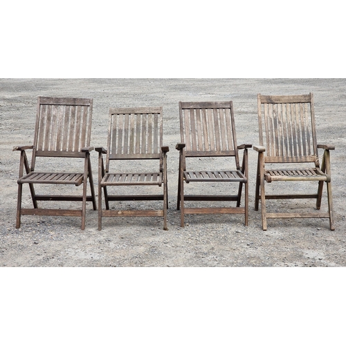1226 - A matched set of four folding teak garden armchairs with slatted seats and backs (4) (AF)
