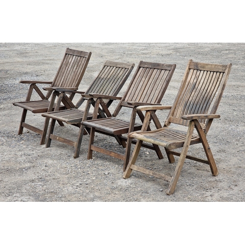 1226 - A matched set of four folding teak garden armchairs with slatted seats and backs (4) (AF)