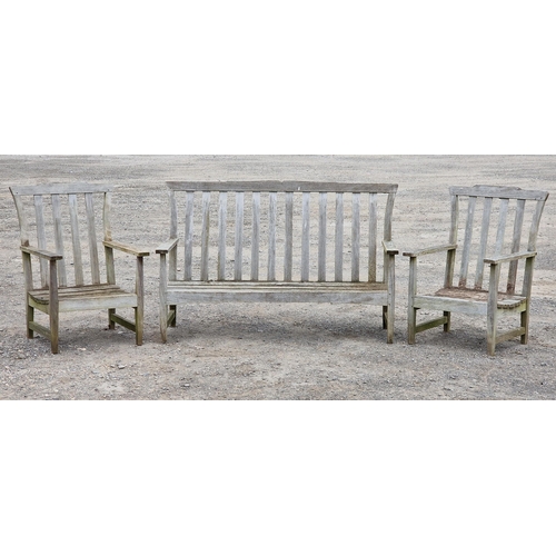 1232 - Three piece teak garden set to include a bench and two chairs with slatted seats and backs, raised o... 