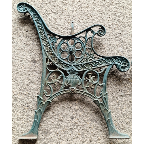 1237 - A pair of cast iron bench ends with pierced scrolling detail and green paintwork, H 72cm