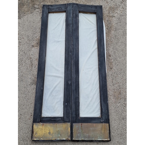 1247 - Pair of French doors of arched form with bevelled edge glass and brass kickplate, H 221cm x W 102cm ... 