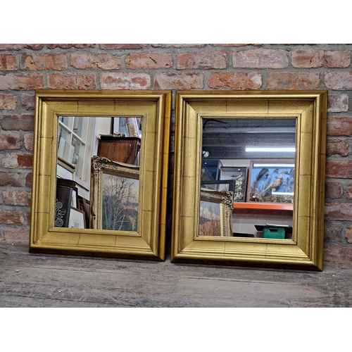 2423 - Pair of contemporary gilt framed wall mirrors, H 74cm x W 64cm (2)