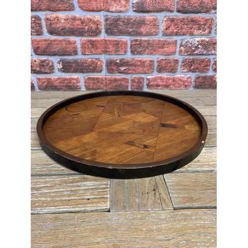 2192 - Parquetry Oak Circular Geometric English Tray made in the Japanese influence, 1920/30s having an ebo... 