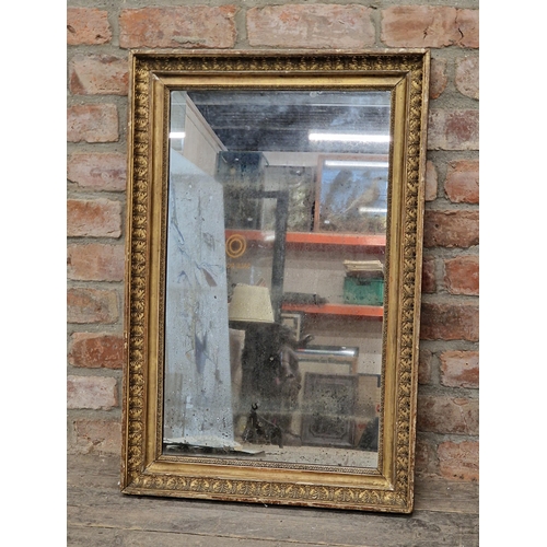 2432 - 19th century giltwood and gesso rectangular wall mirror with original pitted glass, H 83cm x W 54cm