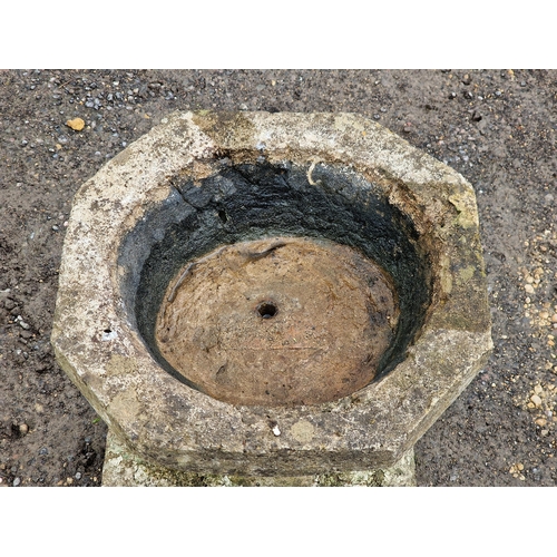 1124 - Weathered reconstituted stone octagonal bird bath with square cut column, H 56cm x W 50cm