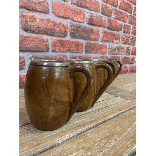 2201 - Matching set of five vintage hand carved wooden beer steins, with silver plated liners and a carving... 