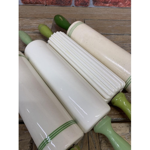 2289 - Kitchenalia - quantity of cream and green ceramic rolling pins to include Nutbrown, Sadler and 