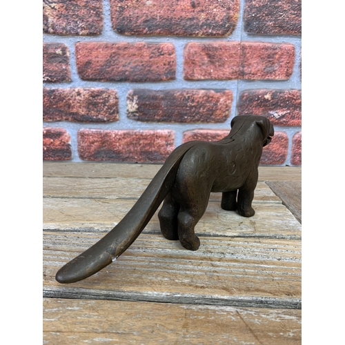 309 - Cast iron dog design nut cracker, L 30cm