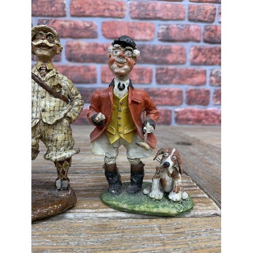 322 - Two hand made clay pottery figures depicting comical huntsman with hounds, H 15cm