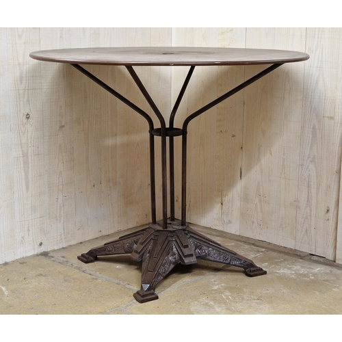 1007 - Louis Vuitton cast iron and steel bistro table, on four supports, with base cast with logo and Art D... 