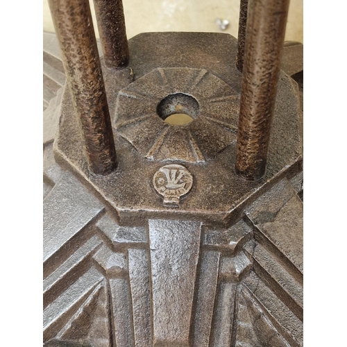 1007 - Louis Vuitton cast iron and steel bistro table, on four supports, with base cast with logo and Art D... 