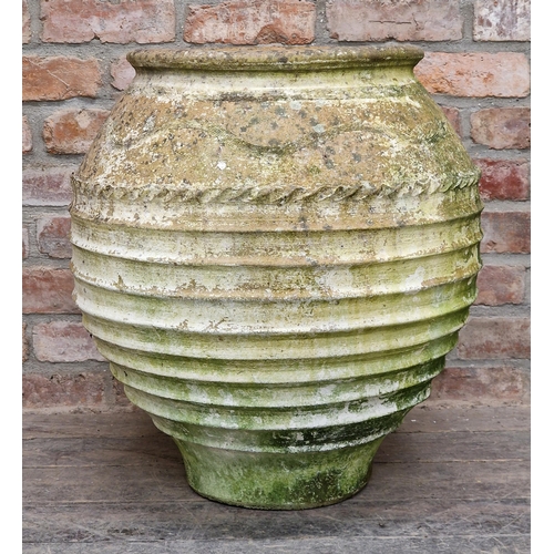 1002 - Good antique well weathered terracotta amphora, with pressed banded decoration, 65cm high